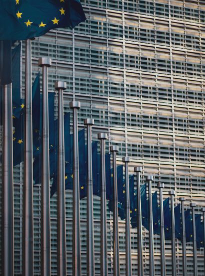 Flags of the European Union in front of the EU-commission building "Berlaymont" in Brussels, Belgium