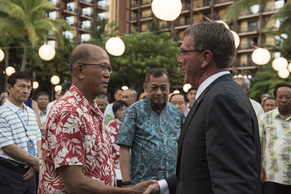 Secretary of Defense Ash Carter speaks with the Philippines' defense secretary Delfin Lorenzana during an official reception the day before the Association of Southeast Asian Nations (ASEAN) conference begins in Kapolei, Hawaii, Sept. 29, 2016. (DoD photo by U.S. Air Force Tech. Sgt. Brigitte N. Brantley)