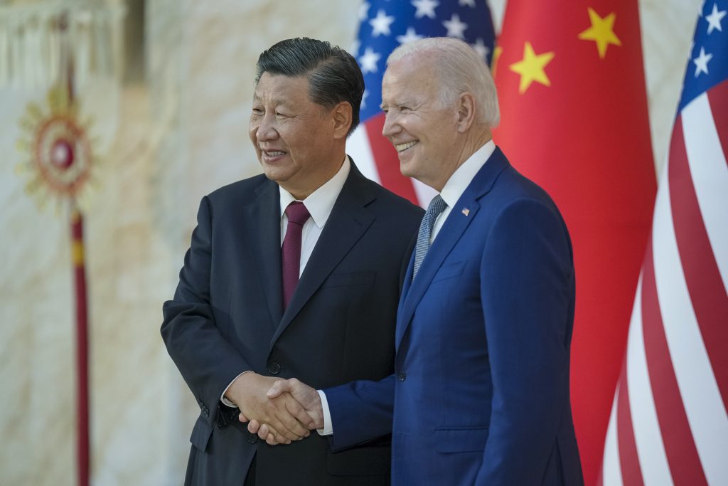President Joe Biden greets and poses for a photo with Chinese President Xi Jingping ahead of their bilateral meeting, Monday, November 14, 2022, at the Mulia Resort in Bali, Indonesia (Photo by Adam Schultz / White House / Flickr.com / RawPixel)