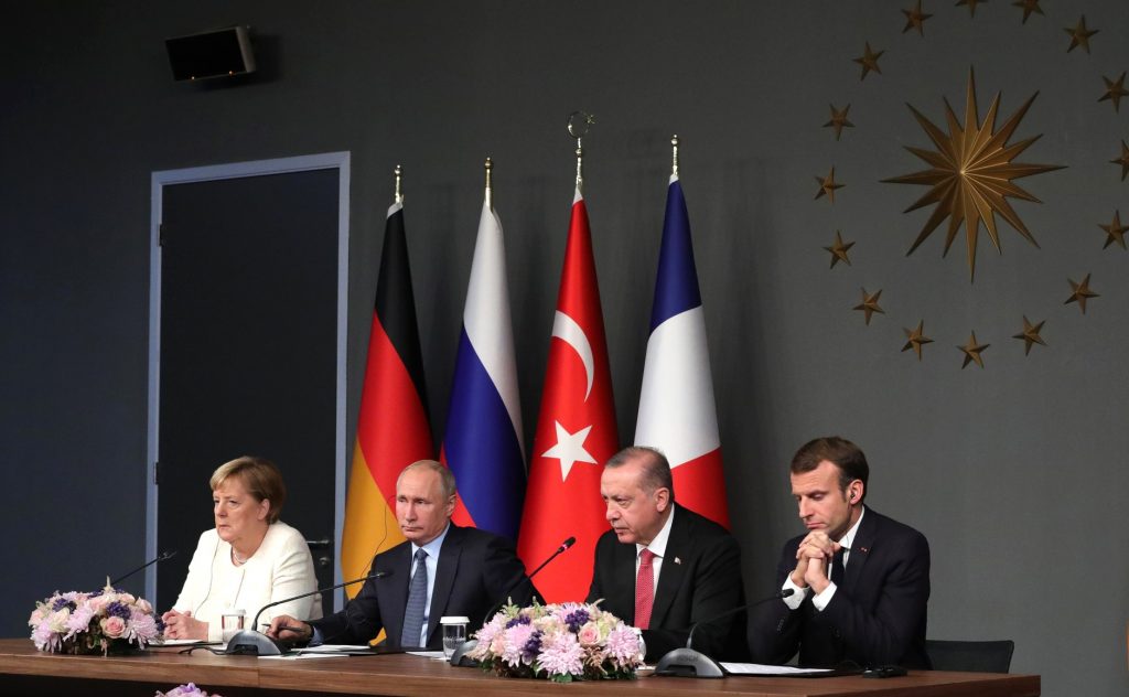 News conference following the meeting of the leaders of Russia, Turkey, Germany and France; Istanbul, Turkey in 2018 (Photo: Kremlin.ru / Wikimedia Commons)