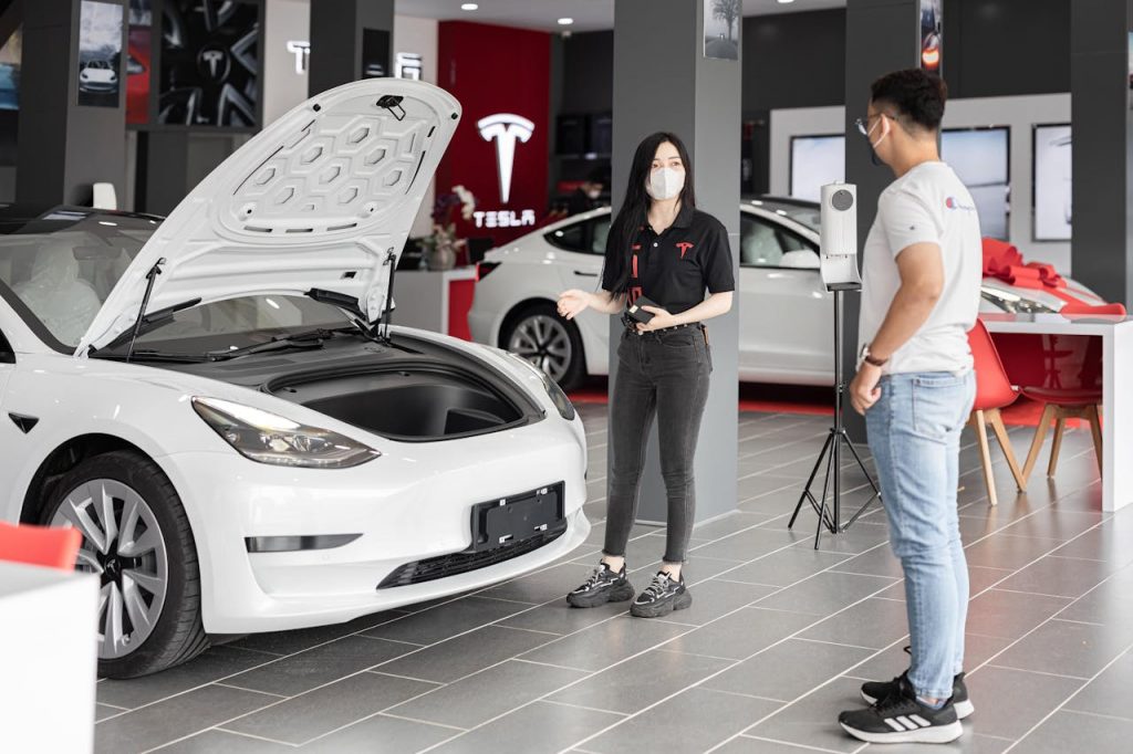 New Tesla model at a car dealership (Source: Pexels.com)