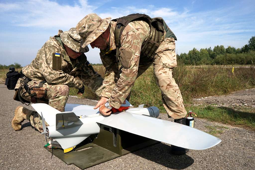 Ukrainian soldiers pack up a drone used for aerial observation during an Operational Capabilities Concept evaluation at the International Peacekeeping and Security Centre in Yavoriv, Ukraine, Sept. 11, 2018 (U.S. Army National Guard photos by Army Spc. Amy Carle)