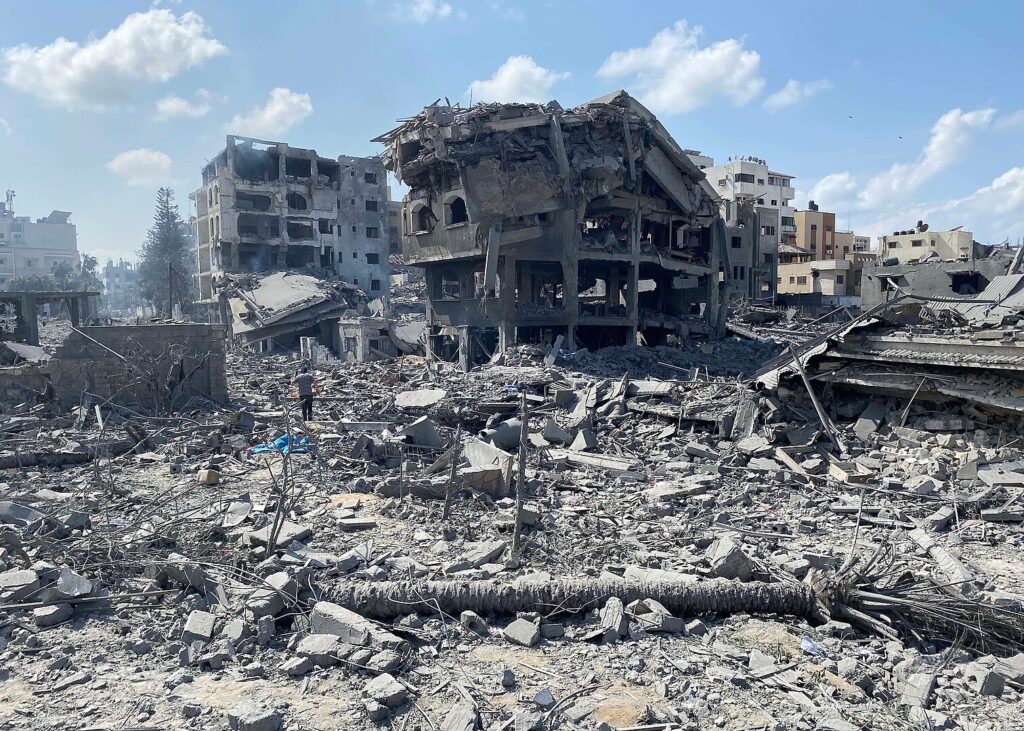 Palestinians inspect the damage following an Israeli airstrike on the El-Remal aera in Gaza City on October 9, 2023. (Photo: Naaman Omar / apaimages / Wikimedia Commons)