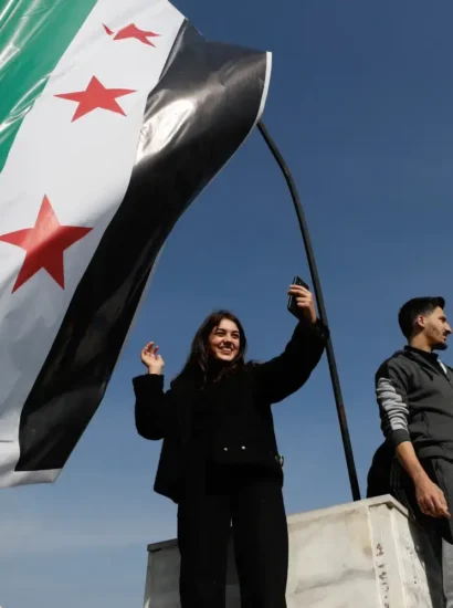 Syrians celebrate the downfall of President Bashar al-Assad near the Umayyad Mosque in Aleppo on Monday (Photo: AP / Free Malaysia Today)