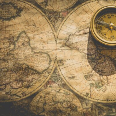 Illustration compass lying on maps