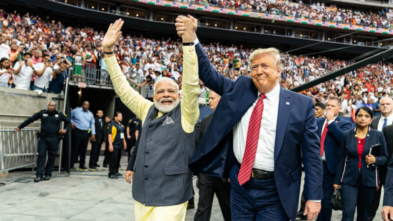 President Donald J. Trump holds hands with Prime Minister Narendra Modi of India as they take a surprise walk together Sunday, Sept. 22, 2019, around the NRG Stadium in Houston, Texas. Photo: Official White House Photo / Shealah Craighead / Wikimedia Commons.