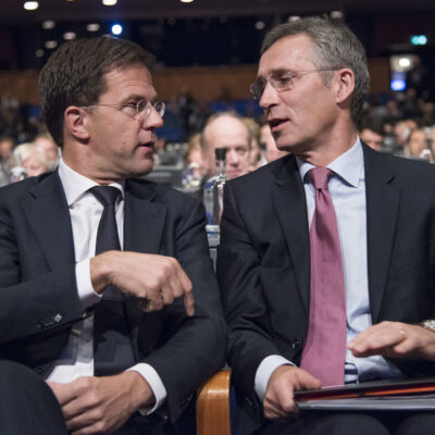 NATO Secretary General Stoltenberg sits with Dutch PM Rutte before his NPA address, 2014. Photo: NATO North Atlantic Treaty Organization / Flickr, CC BY-NC-ND 2.0