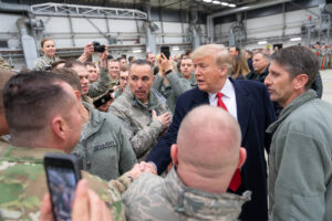 President Trump and the First Lady Visit Troops at Ramstein Air Force Base in Germany, 2018. Photo source: Official White House Photo / Shealah Craighead / Trump White House Archived / Flickr, Public Domain Mark.