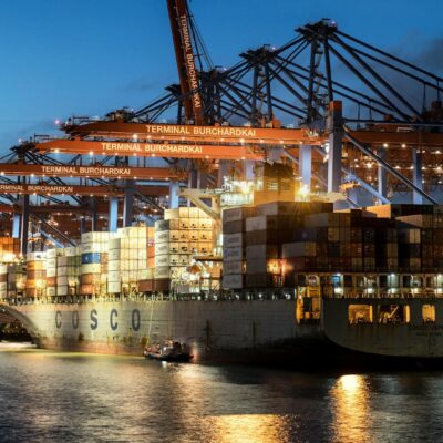 Cargo Ship in Harbor in Hamburg in Germany. Photo source: Wolfgang Weiser / Pexels, Public Domain.