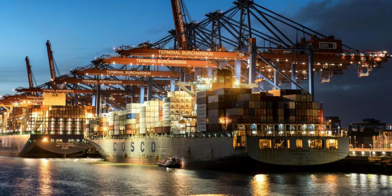 Cargo Ship in Harbor in Hamburg in Germany. Photo source: Wolfgang Weiser / Pexels, Public Domain.