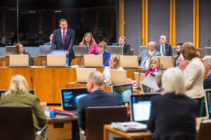 Plaid Cymru Leader Rhun ap Iorwerth MS/AS speaking in the Senedd. Photo Source: Senedd Cymru / Welsh Parliament / Flickr, CC BY 2.0