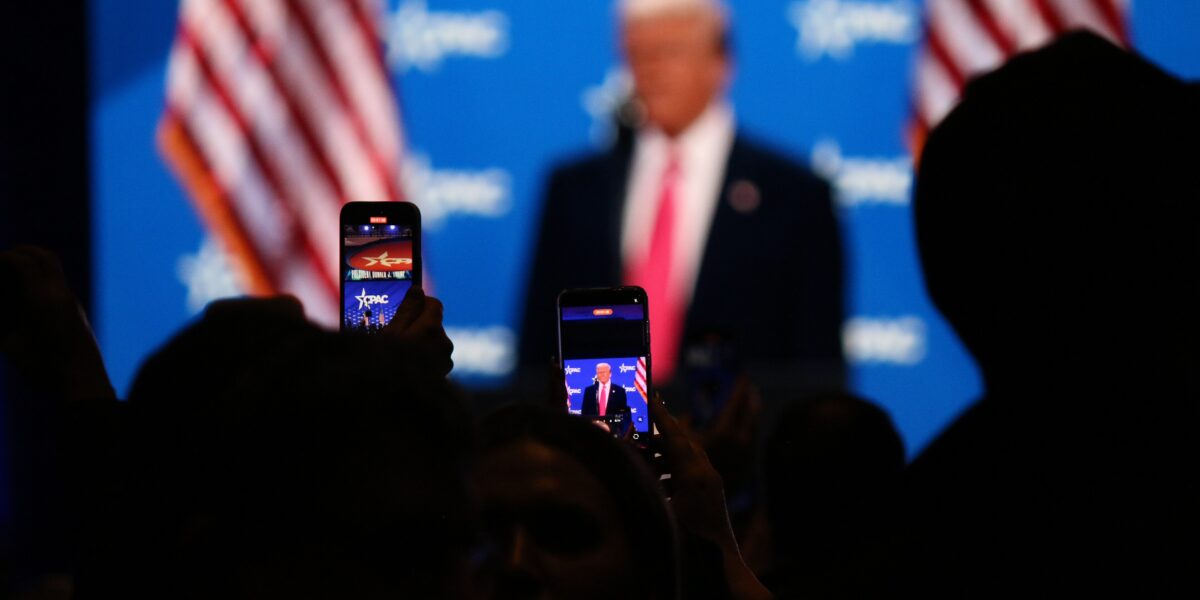 Crowd taking photos of Donald Trump on their phones at CPAC 2025. Photo source: Xuthoria / Wikimedia Commons, CC BY-SA 4.0