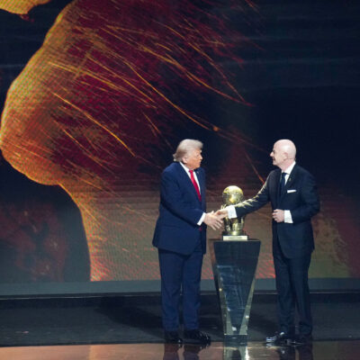 trump infantinoFIFA President Gianni Infantino and U.S. President Donald Trump shake hands during the FIFA World Cup 2026 official draw at the John F. Kennedy Center for the Performing Arts in Washington, D.C., December 5, 2025. (Official State Department photo by Freddie Everett)