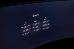 Close-up of a computer screen displaying ChatGPT interface in a dark setting. Photo source: Matheus Bertelli / Pexels. 