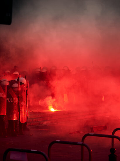 france, Police,Cordon,And,Red,Flares,During,Street,Protest