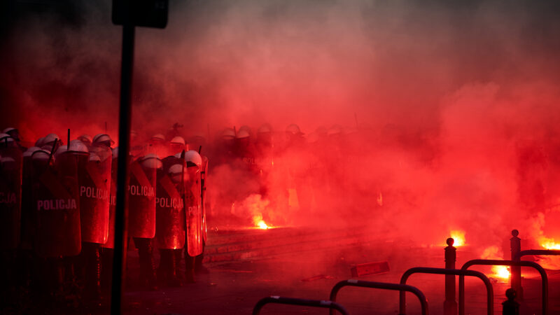 france, Police,Cordon,And,Red,Flares,During,Street,Protest